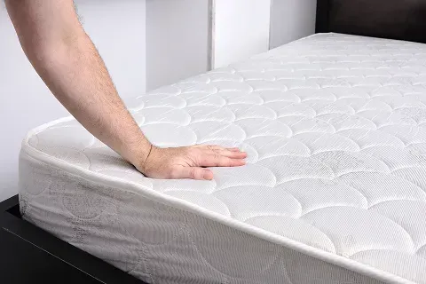 hand-touching-mattress